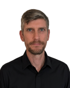 Brett Headshot - Blackshirt